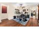 This room includes hardwood floors and beige walls at 3654 Limestone St, Clermont, FL 34711