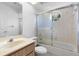 Bright bathroom featuring tub and shower combo and vanity sink at 36545 Scottsdale Dr, Grand Island, FL 32735