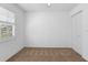 Bedroom with carpet, bright natural light, and closet with doors at 36545 Scottsdale Dr, Grand Island, FL 32735