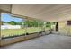 Screened-in lanai overlooking the backyard at 36545 Scottsdale Dr, Grand Island, FL 32735