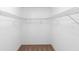 Empty walk-in closet with shelves and carpet flooring at 36545 Scottsdale Dr, Grand Island, FL 32735