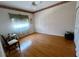 Empty bedroom with hardwood floors and a window at 3708 Fairfield Dr, Clermont, FL 34711