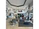 Spacious, well-lit lobby with comfortable seating, elegant decor, and reception area at 3708 Fairfield Dr, Clermont, FL 34711