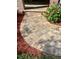 The home features a beautiful stone tile walkway and manicured landscape at 3708 Fairfield Dr, Clermont, FL 34711
