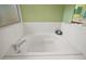 Bright bathroom showcasing a soaking tub with tile surround at 3828 Arbordale Ct, Leesburg, FL 34748