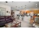 Bright open concept design with bar seating, living room and open access to the kitchen at 3828 Arbordale Ct, Leesburg, FL 34748