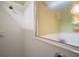 Close-up of a tiled shower with glass door at 3828 Arbordale Ct, Leesburg, FL 34748