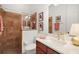 Full bathroom with framed glass shower, decorative tile work, and wood vanity cabinet at 38716 Oak Place Ct, Lady Lake, FL 32159