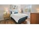 Cozy bedroom featuring bright natural light, and simple but elegant furniture at 38716 Oak Place Ct, Lady Lake, FL 32159