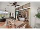 Spacious dining area with outdoor access, perfect for alfresco dining and enjoying the beautiful weather at 38716 Oak Place Ct, Lady Lake, FL 32159