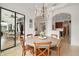 Elegant dining room with open concept, perfect for entertaining guests with gourmet kitchen views at 38716 Oak Place Ct, Lady Lake, FL 32159