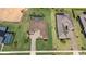 This aerial view showcases the spacious lot, large pool and outdoor space of the property at 39505 Hillrise Ln, Lady Lake, FL 32159