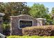 BellaVista at Harbor Hills community entrance sign with stone details and landscaping at 39505 Hillrise Ln, Lady Lake, FL 32159