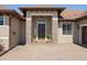 Inviting entryway with stone accents, well-manicured landscaping, and a decorative front door at 39505 Hillrise Ln, Lady Lake, FL 32159