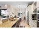 Kitchen with granite countertops, stainless steel appliances, and breakfast nook with lots of natural light at 39505 Hillrise Ln, Lady Lake, FL 32159