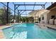 The backyard boasts a private pool, perfect for enjoying sunny days and creating lasting memories at 39505 Hillrise Ln, Lady Lake, FL 32159