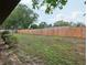The large backyard is fenced in and ready for entertaining at 4145 Dora Wood Dr, Mount Dora, FL 32757