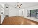 Inviting living room with hardwood floors, lots of natural light and a glimpse of a window box at 4145 Dora Wood Dr, Mount Dora, FL 32757