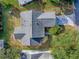 This is an aerial view of the property showing a well-maintained roof and tidy lawn at 507 Torres Pl, The Villages, FL 32159
