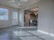 View of dining room with access to the kitchen and living room with natural light at 507 Torres Pl, The Villages, FL 32159