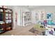 Multipurpose bonus room with ample storage, laminate floors, and lots of space for activities at 5195 Greens Dr, Lady Lake, FL 32159