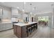 Beautiful kitchen with a large island, modern appliances, and elegant finishes, perfect for cooking and entertaining at 5195 Greens Dr, Lady Lake, FL 32159
