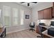 Bright office space with ample natural light, built-in storage, and contemporary furnishings at 5195 Greens Dr, Lady Lake, FL 32159
