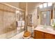 Elegant bathroom featuring shower/tub combo, swan image on the shower door, and a vanity at 605 Westview Dr, Minneola, FL 34715