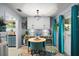 Charming breakfast nook featuring a round table, cheerful decor, and bright natural light at 638 Mount Homer Rd # 3-C, Eustis, FL 32726