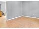 Spacious bedroom with neutral walls and an open doorway to the bathroom at 685 Reindeer Dr, Kissimmee, FL 34759