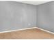 A minimal bedroom with neutral wall color, base trim and tile floors at 685 Reindeer Dr, Kissimmee, FL 34759