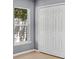 Bedroom featuring a window and a double-door closet for ample storage at 685 Reindeer Dr, Kissimmee, FL 34759