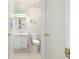 Bright bathroom with a toilet and a vanity with a sink at 705 Prado Dr, The Villages, FL 32159