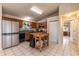 Well-appointed kitchen features stainless appliances, modern tile flooring, and ample storage space at 7938 Jacksons River Rd, Leesburg, FL 34788