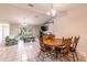 Bright open living space features dining area, living room, and lots of natural light at 7938 Jacksons River Rd, Leesburg, FL 34788