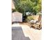 Backyard featuring a storage shed and a charcoal grill on a concrete patio at 802 Haselton St, Eustis, FL 32726