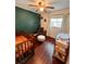 Cozy bedroom with wood flooring and a large window at 802 Haselton St, Eustis, FL 32726