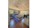 Contemporary bedroom with ambient under-lighting on the bed and a minimalist design offering a modern, relaxing space at 802 Haselton St, Eustis, FL 32726