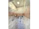 Modern shower showcasing marble tile, shower head, and built-in storage; creating a spa-like experience at 802 Haselton St, Eustis, FL 32726