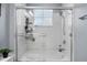 Bathroom showcasing the glass-enclosed shower and soaking tub at 8256 Maritime Flag St # 103, Windermere, FL 34786