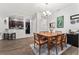 Stylish dining area with an adjacent kitchen at 8256 Maritime Flag St # 103, Windermere, FL 34786