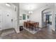Bright dining area features wood floors, neutral walls, and a chandelier at 8256 Maritime Flag St # 103, Windermere, FL 34786