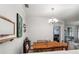 Cozy dining room featuring a wood table with seating for four and stylish decor at 8256 Maritime Flag St # 103, Windermere, FL 34786