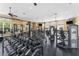 Well-equipped fitness center featuring modern exercise machines and free weights for a complete workout at 8256 Maritime Flag St # 103, Windermere, FL 34786
