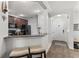 Eat-in kitchen featuring a breakfast bar, and stainless steel appliances at 8256 Maritime Flag St # 103, Windermere, FL 34786