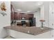 Beautiful kitchen with modern appliances, wood cabinets, and plenty of counter space at 8256 Maritime Flag St # 103, Windermere, FL 34786