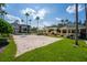 Sand volleyball court surrounded by lush landscaping, perfect for outdoor recreation and friendly competition at 8256 Maritime Flag St # 103, Windermere, FL 34786