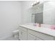 Bathroom with a vanity, modern lighting, and a toilet for added convenience at 853 Laurel View Way, Groveland, FL 34736
