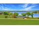 Ariel view of lakefront property, showing the home's location and access to the lake at 9510 Suggs Rd, Clermont, FL 34711