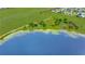 Beautiful aerial view of waterfront land, showcasing lake access and acreage at 9510 Suggs Rd, Clermont, FL 34711
